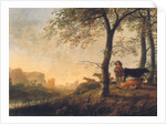 Evening river landscape with a cowherd and cows by the edge of a copse, a bridge and ruins beyond by Abraham van Calraet