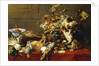 A Basket of Fruit on a Draped Table with Dead Game and a Monkey by Frans Snyders or Snijders