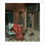 Interior with a carpet, a sword and a jug on a table, a cello on a chair, a coat hanging on a cupboard, a cat playing with a ball, a maid beyond by Cornelis de Man