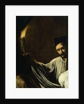 A man holding a torch and burying a dead by Michelangelo Merisi da Caravaggio