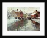 Snow-covered buildings by a river by Fritz Thaulow