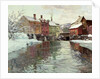 Snow-covered buildings by a river by Fritz Thaulow