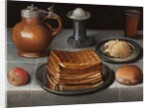 Waffles and butter on pewter plates with an apple, roll, jug, standing salt, and a beer glass with prunts on a cloth-covered table by German School