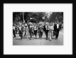 The March on Washington: Marchers Wearing Hats Carry Puerto Rican Flags Down Constitution Avenue, 29th August 1963 by Nat Herz