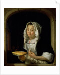 Portrait of a maid holding a waffle by Godfried Schalcken