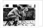 Portrait of German writer Paul Eipper with his dog by German Photographer