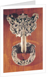 Pu shou' door knocker with a taotie design surmounted by a phoenix and holding a ring with sculpted animals by Chinese School