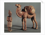 Funerary statuettes of a laden camel and a barbarian caravanner, Tang Dynasty by School Chinese
