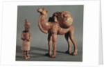 Funerary statuettes of a laden camel and a barbarian caravanner, Tang Dynasty by School Chinese