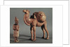 Funerary statuettes of a laden camel and a barbarian caravanner, Tang Dynasty by School Chinese