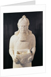 Statuette of a man carrying a box by Assyrian