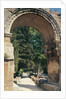 View of the Allee de Sarcophages through the remains of the entrance of the Church of St. Cesaire le Vieux by Anonymous