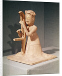 Seated musician playing a harp by Sui Dynasty Chinese School