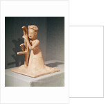 Seated musician playing a harp by Sui Dynasty Chinese School