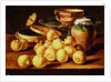 Still life with quinces, a silver fruit dish, bowls. a box for sweets and a butterfly by Luis Egidio Menendez or Melendez