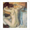 Woman combing her hair, c.1885 by Edgar Degas