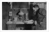 Otto Nordenskjöld at his desk, Snow Hill, Antarctica, 1901-03 by Anonymous