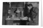 Otto Nordenskjöld at his desk, Snow Hill, Antarctica, 1901-03 by Anonymous