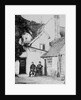 Two men outside Enfield cottage, c.1890 by English Photographer