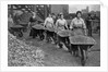 Women Barrowing Coke at a Gas Works, War Office photographs, 1916 by English Photographer