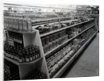 Paint and brushes aisle, Woolworths store, 1956 by English Photographer