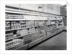 Cake and pudding mixture aisle, Woolworths store, 1956 by English Photographer