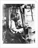 Man working at a handloom by English Photographer