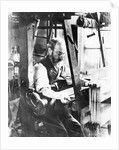 Man working at a handloom by English Photographer