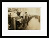 Boy sweeper by carding machines at Lincoln Cotton Mills, Evansville, Indiana in stockinged feet on a slippery floor, 1908 by Lewis Wickes Hine
