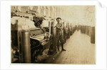 Boy sweeper by carding machines at Lincoln Cotton Mills, Evansville, Indiana in stockinged feet on a slippery floor, 1908 by Lewis Wickes Hine