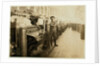 Boy sweeper by carding machines at Lincoln Cotton Mills, Evansville, Indiana in stockinged feet on a slippery floor, 1908 by Lewis Wickes Hine
