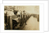 Boy sweeper by carding machines at Lincoln Cotton Mills, Evansville, Indiana in stockinged feet on a slippery floor, 1908 by Lewis Wickes Hine