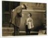 8 year old newsboy Michael McNelis, who'd just recovered from his second bout of pneumonia, selling papers in a rain storm by Lewis Wickes Hine