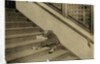 Newsboy asleep with his papers in Jersey City, New Jersey, 1912 by Lewis Wickes Hine