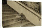 Newsboy asleep with his papers in Jersey City, New Jersey, 1912 by Lewis Wickes Hine