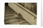 Newsboy asleep with his papers in Jersey City, New Jersey, 1912 by Lewis Wickes Hine