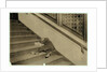 Newsboy asleep with his papers in Jersey City, New Jersey, 1912 by Lewis Wickes Hine