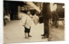 6 year old newsboy Hyman selling papers until 6 p.m. in Lawrence, Massachusetts, 1911 by Lewis Wickes Hine