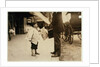 6 year old newsboy Hyman selling papers until 6 p.m. in Lawrence, Massachusetts, 1911 by Lewis Wickes Hine
