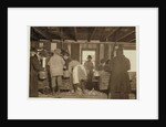 10 year old Mike Murphy, 7 year old Annie Healy and 10 year old Ross Healy in the shucking shed at Alabama Canning Co, Bayou La Batre, Alabama, 1911 by Lewis Wickes Hine