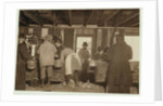 10 year old Mike Murphy, 7 year old Annie Healy and 10 year old Ross Healy in the shucking shed at Alabama Canning Co, Bayou La Batre, Alabama, 1911 by Lewis Wickes Hine
