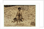 5 year old migrant shrimp-picker Manuel in front of a pile of oyster shells by Lewis Wickes Hine