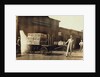 Men in front of a Wells Fargo & Co Express depot with crates and milk cans, Springfiled, Missouri, 1916 by Lewis Wickes Hine