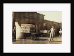 Men in front of a Wells Fargo & Co Express depot with crates and milk cans, Springfiled, Missouri, 1916 by Lewis Wickes Hine