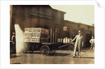 Men in front of a Wells Fargo & Co Express depot with crates and milk cans, Springfiled, Missouri, 1916 by Lewis Wickes Hine