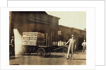 Men in front of a Wells Fargo & Co Express depot with crates and milk cans, Springfiled, Missouri, 1916 by Lewis Wickes Hine