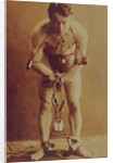 Harry Houdini in chains, c.1899 by American Photographer