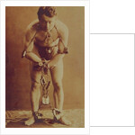 Harry Houdini in chains, c.1899 by American Photographer