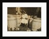 Mary Christmas, only 3, made to pick cranberries spilt at the barrels by her grandfather, Week's Bog, Falmouth, Massachusetts, 1911 by Lewis Wickes Hine