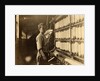 John Dempsey, 11 or 12 years old, Saturday worker in the mule-spinning room at Jackson Mill, Fiskeville, Rhode Island, 1909 by Lewis Wickes Hine